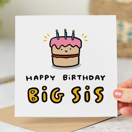 Playful birthday card for a big sister, featuring bold text that reads 'Happy Birthday Big Sis' beneath a quirky birthday cake illustration.