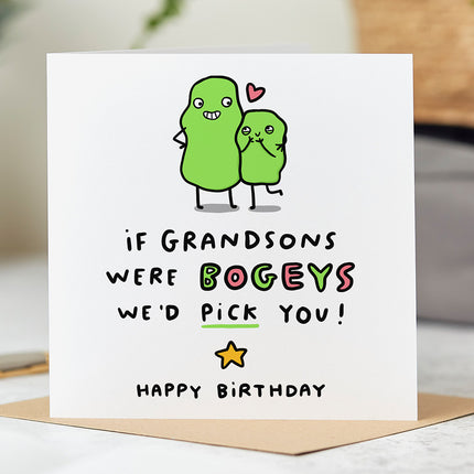 White greeting card with the text 'If Grandsons Were Bogeys We'd Pick You' and a playful illustration of two hugging 'bogeys'.