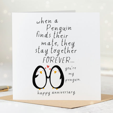 Greeting card that reads 'when a penguin finds their mate, they stay together forever... you're my penguin. happy anniversary.' followed by a cute illustration of two penguins holding hands.