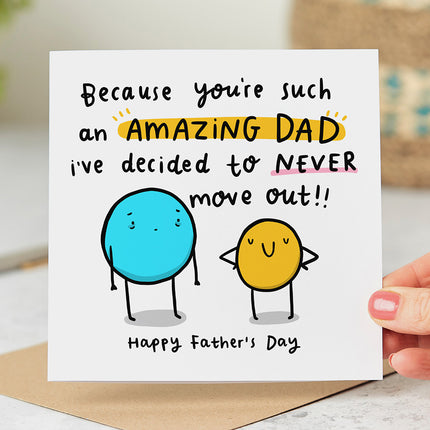 A white folded Father's Day card that says 'Because you're such an amazing Dad I've decided to never move out'.
