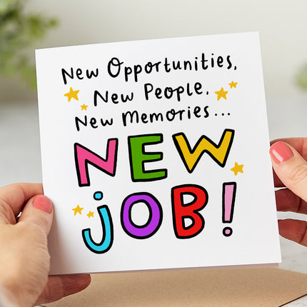 Folded white card that says 'New opportunities, new people, new memories... new job!'