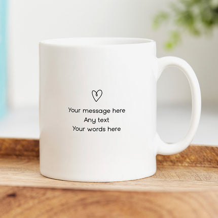 Reverse side of a white ceramic mug with a heart image and a sample of personalised text.