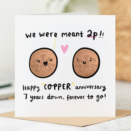 Anniversary card with a quirky illustration of two two pence pieces with smiling faces. The text reads: We Were Meant 2p!! Happy Copper Anniversary, 7 Years Down, Forever To Go!
